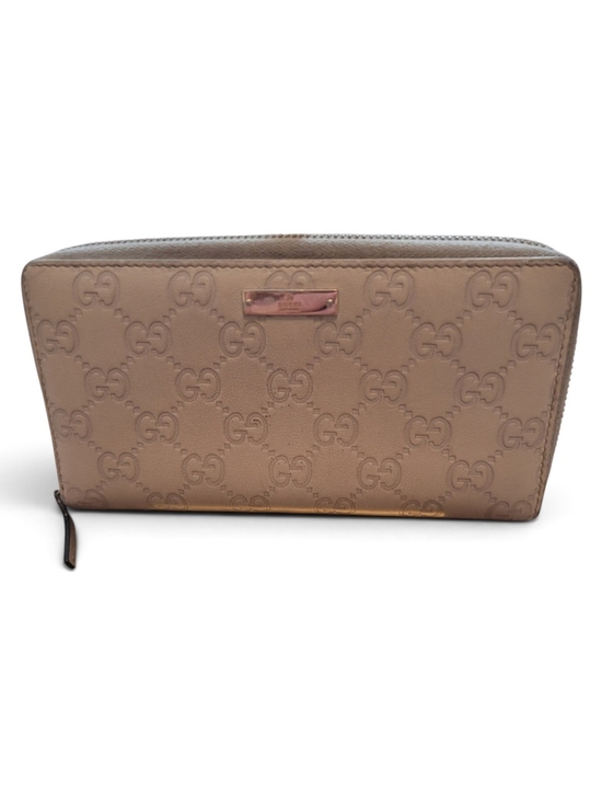 Gucci Handbags - Gucci Beige Guccissima Leather
Zip-Around Wallet